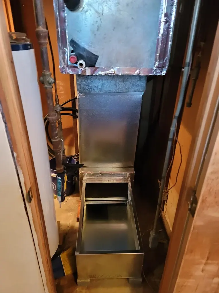 High-efficiency furnace + new supply plenum installed by Watson Heating + Cooling